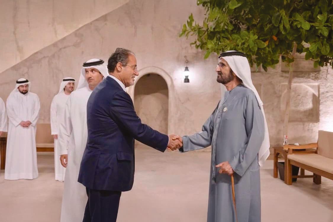 Moafaq A. Al Gaddah at a formal partnership signing.